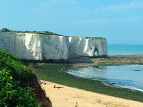 bay with white cliffs and sea