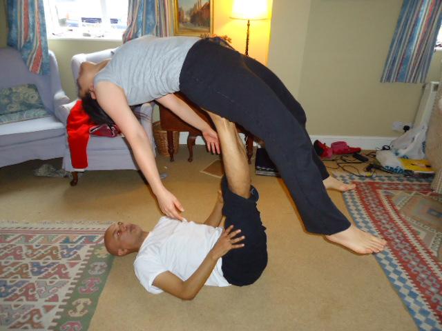 Partner Yoga, back bend lift